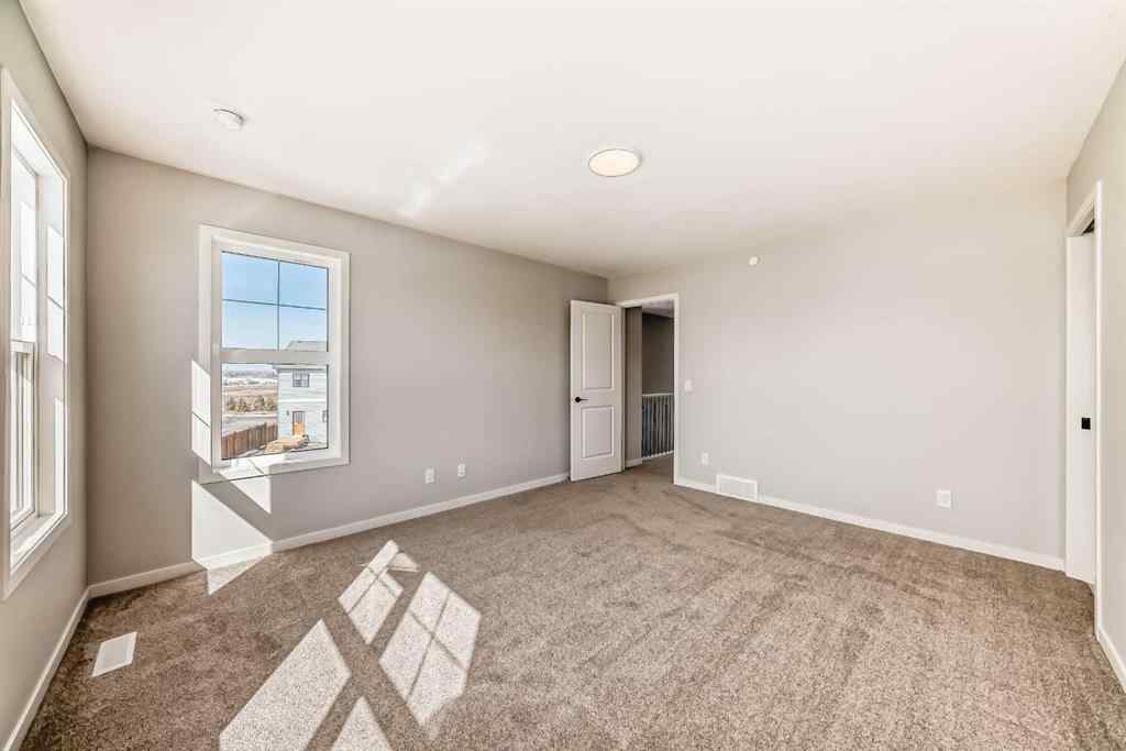 MLS® A2204993 - 34 Hotchkiss Row SE in Hotchkiss Calgary, Residential