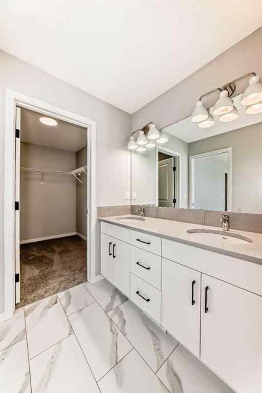 MLS® A2204993 - 34 Hotchkiss Row SE in Hotchkiss Calgary, Residential