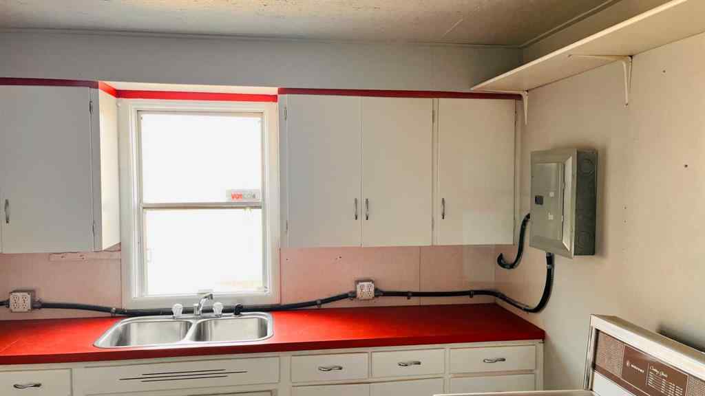 MLS® A2205348 - 218 Main Street  in NONE Burdett, Commercial