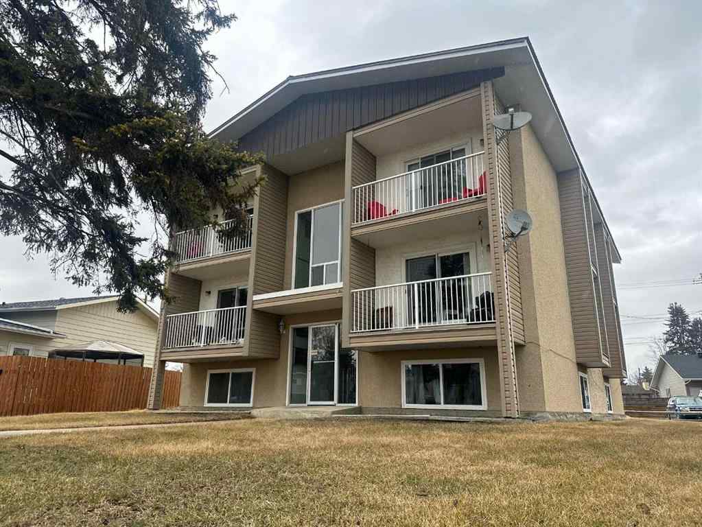MLS® A2205425 - Unit #1-6 5704 44 Avenue  in Downtown Lacombe Lacombe, Multi-Family