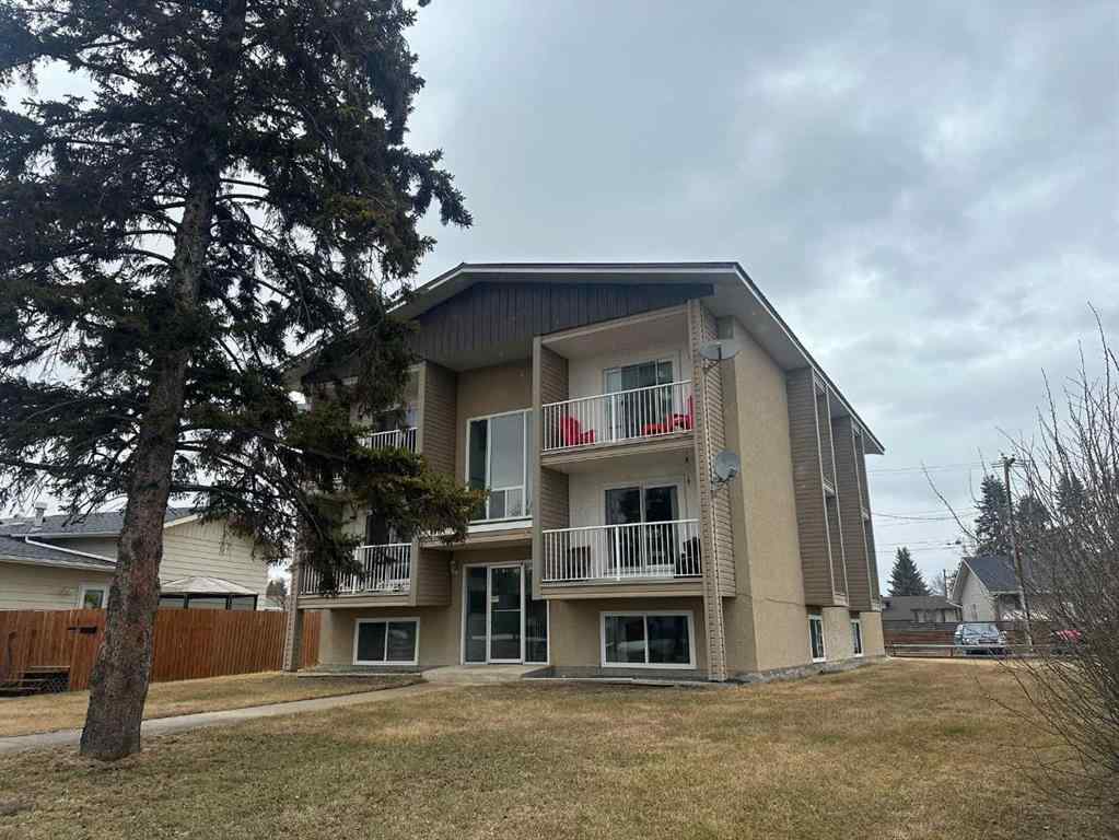 MLS® A2205425 - Unit #1-6 5704 44 Avenue  in Downtown Lacombe Lacombe, Multi-Family