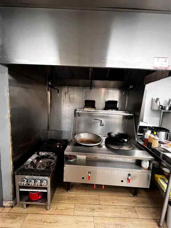 MLS® A2205743 - 123 Any Street  in Crescent Heights Calgary, Commercial