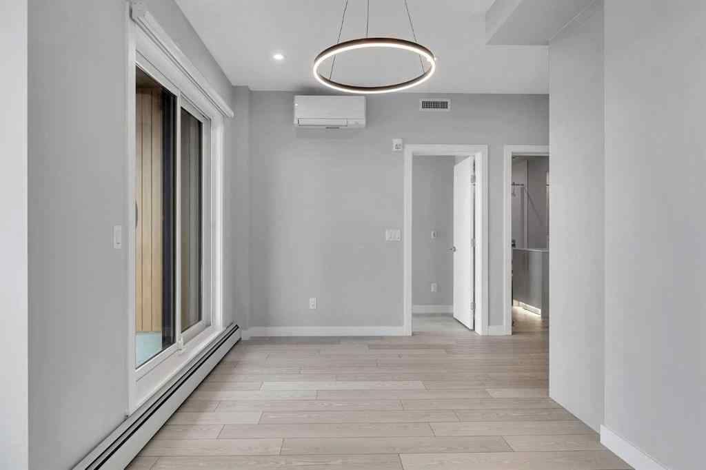MLS® A2206084 - Unit #401 8370 Broadcast Avenue SW in West Springs Calgary, Residential