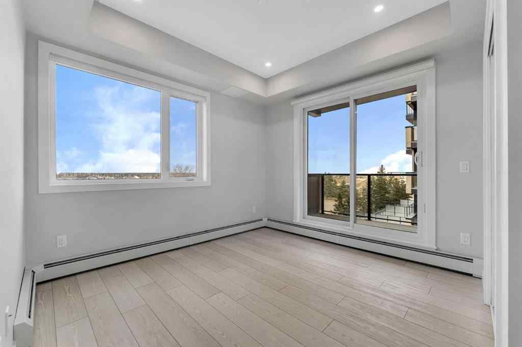 MLS® A2206084 - Unit #401 8370 Broadcast Avenue SW in West Springs Calgary, Residential