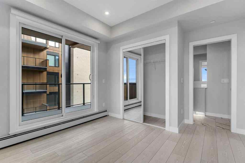 MLS® A2206084 - Unit #401 8370 Broadcast Avenue SW in West Springs Calgary, Residential