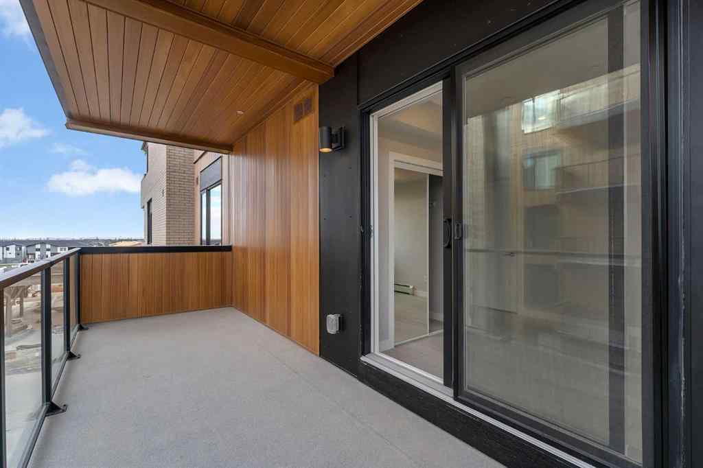 MLS® A2206084 - Unit #401 8370 Broadcast Avenue SW in West Springs Calgary, Residential