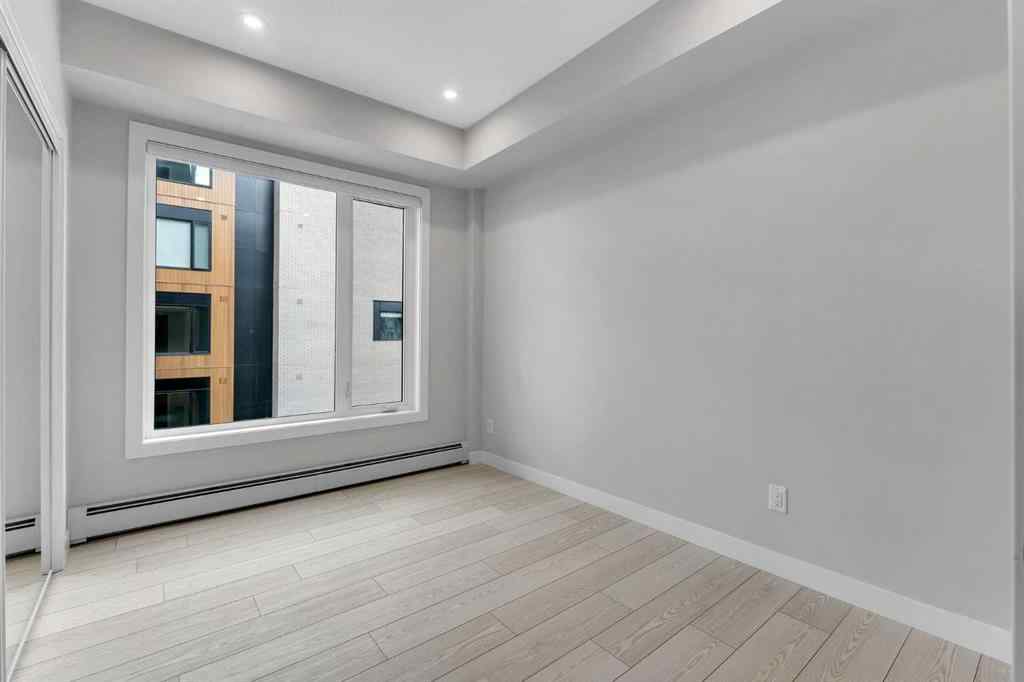 MLS® A2206084 - Unit #401 8370 Broadcast Avenue SW in West Springs Calgary, Residential