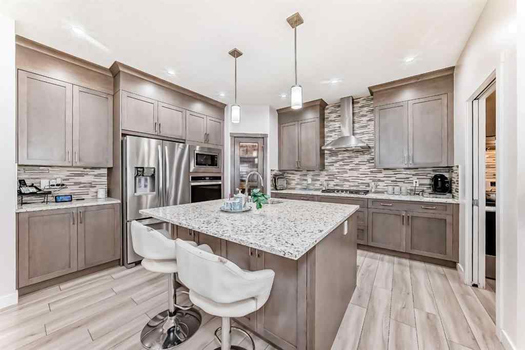 MLS® A2206319 - 67 Saddlestone Heath NE in Saddle Ridge Calgary, Residential