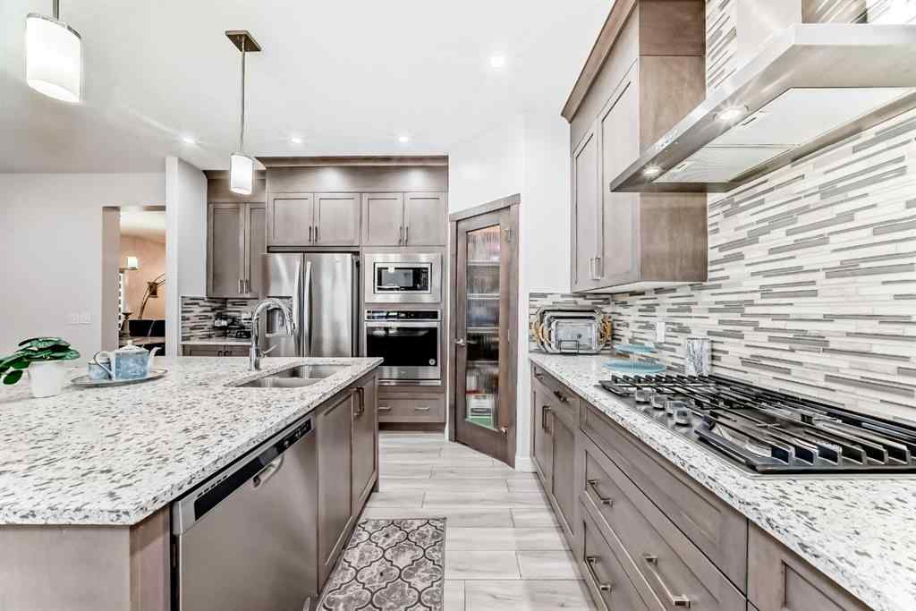 MLS® A2206319 - 67 Saddlestone Heath NE in Saddle Ridge Calgary, Residential