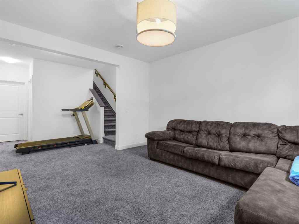 MLS® A2206366 - 18 West Grove Mews SW in West Springs Calgary, Residential