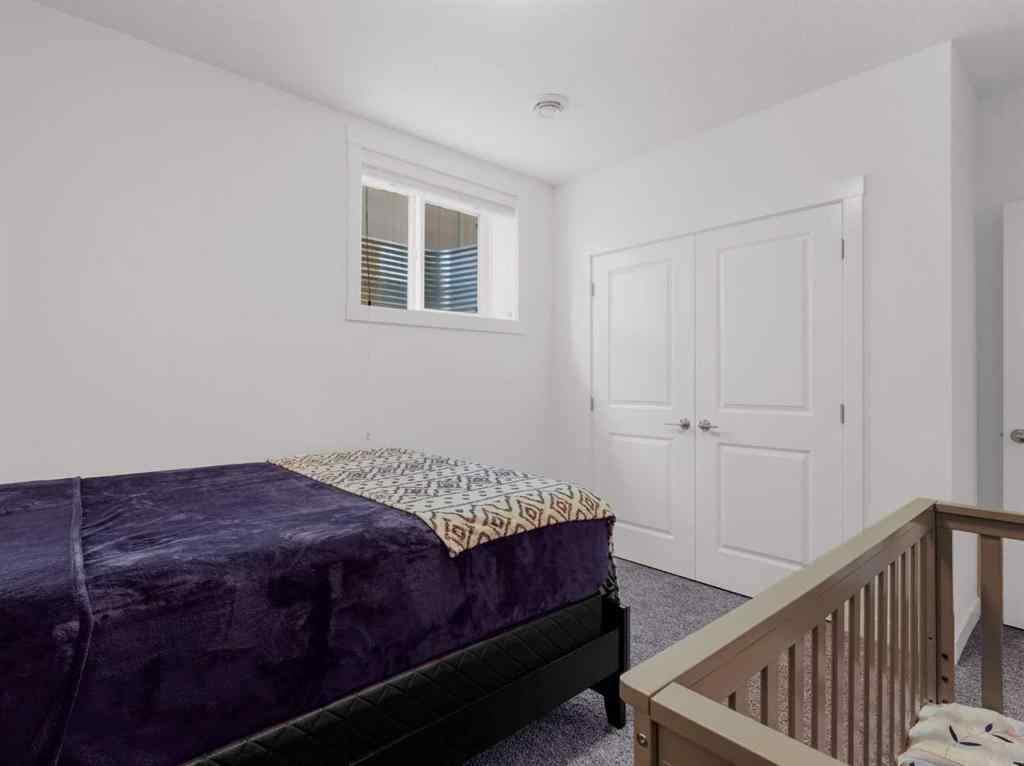MLS® A2206366 - 18 West Grove Mews SW in West Springs Calgary, Residential