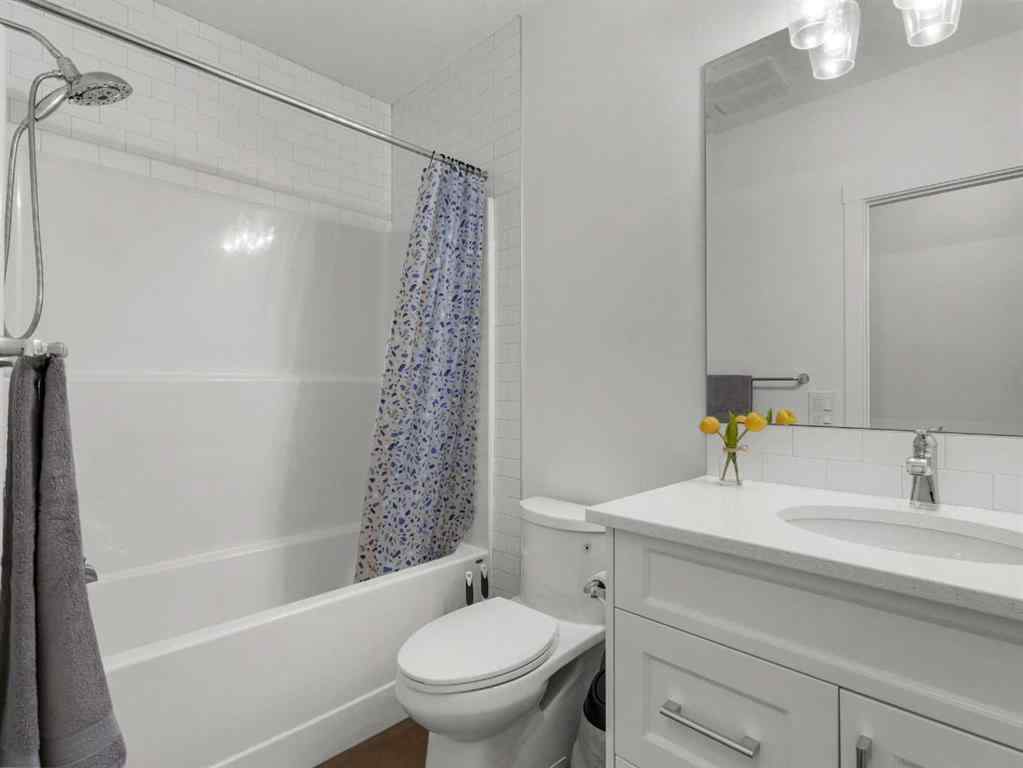 MLS® A2206366 - 18 West Grove Mews SW in West Springs Calgary, Residential