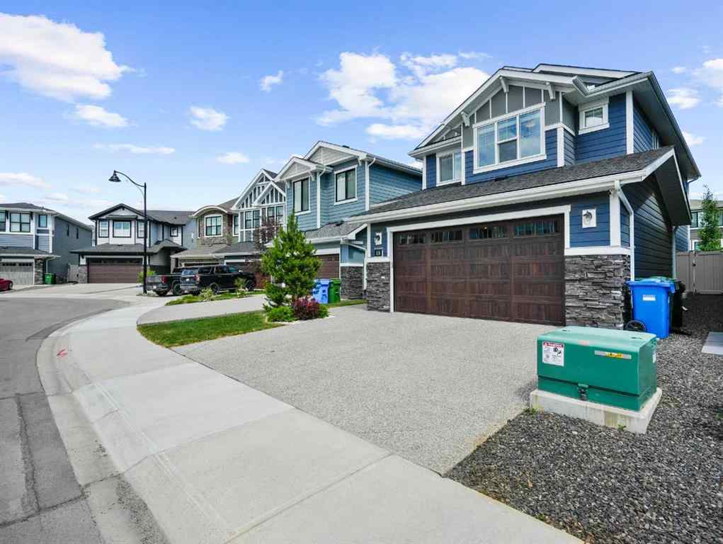 MLS® A2206366 - 18 West Grove Mews SW in West Springs Calgary, Residential