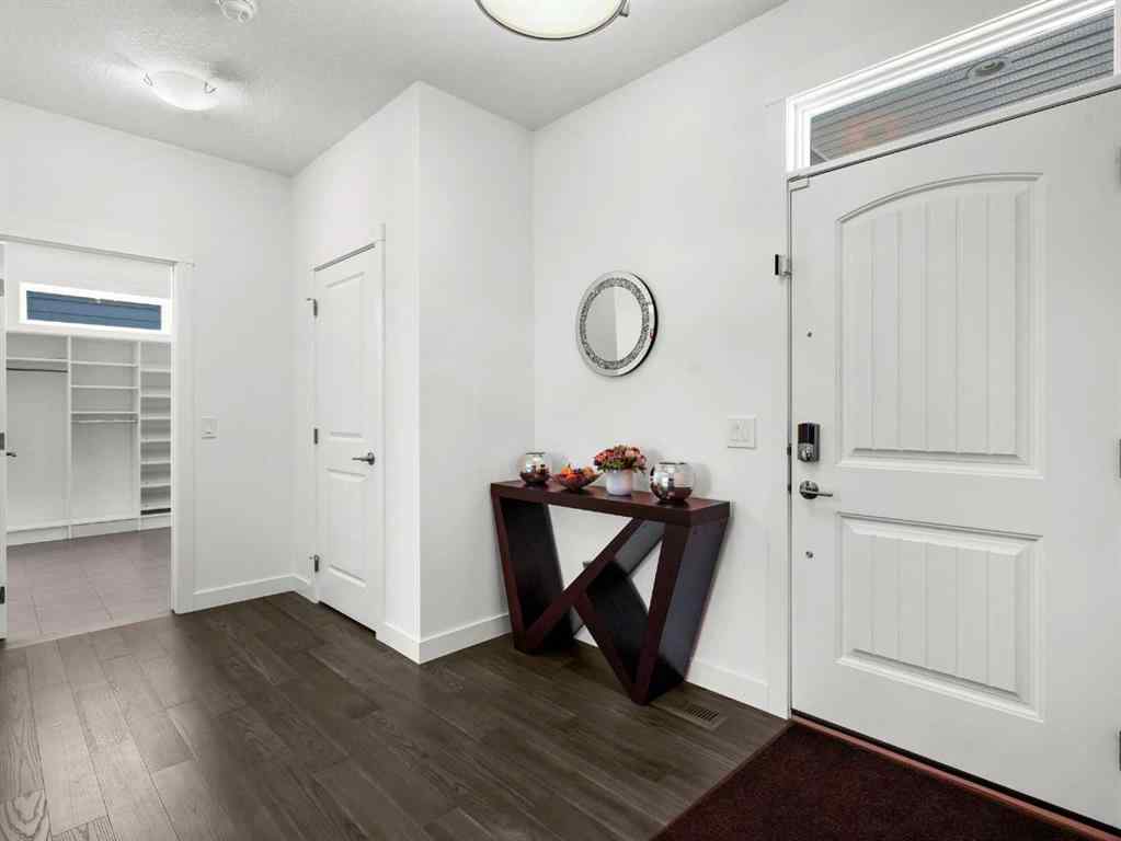 MLS® A2206366 - 18 West Grove Mews SW in West Springs Calgary, Residential