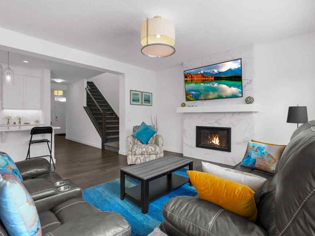 MLS® A2206366 - 18 West Grove Mews SW in West Springs Calgary, Residential