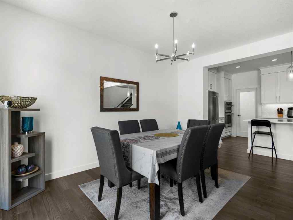 MLS® A2206366 - 18 West Grove Mews SW in West Springs Calgary, Residential