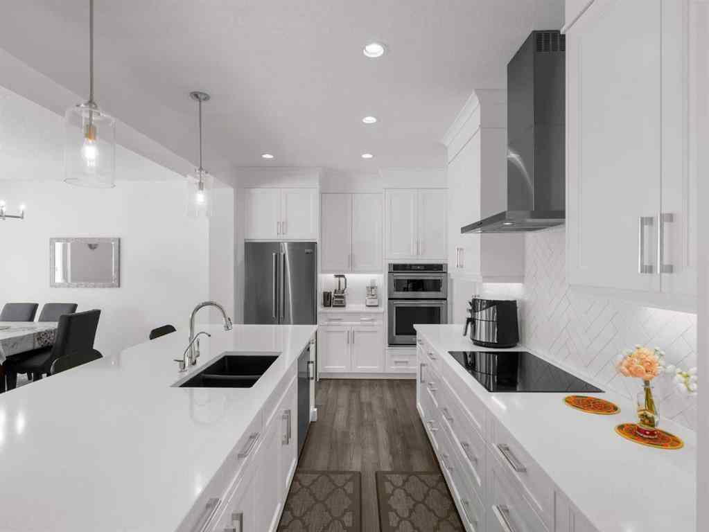 MLS® A2206366 - 18 West Grove Mews SW in West Springs Calgary, Residential