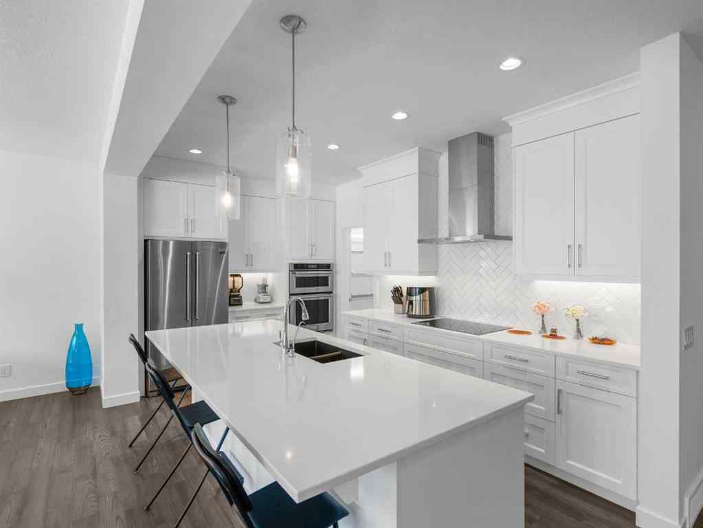 MLS® A2206366 - 18 West Grove Mews SW in West Springs Calgary, Residential