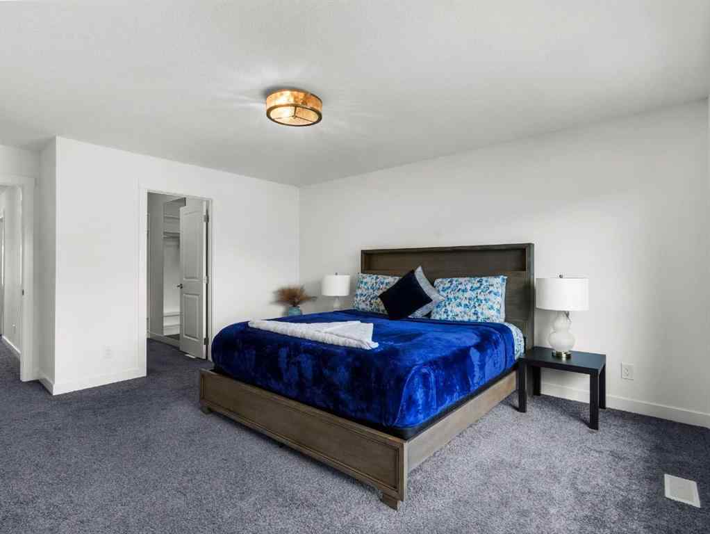 MLS® A2206366 - 18 West Grove Mews SW in West Springs Calgary, Residential