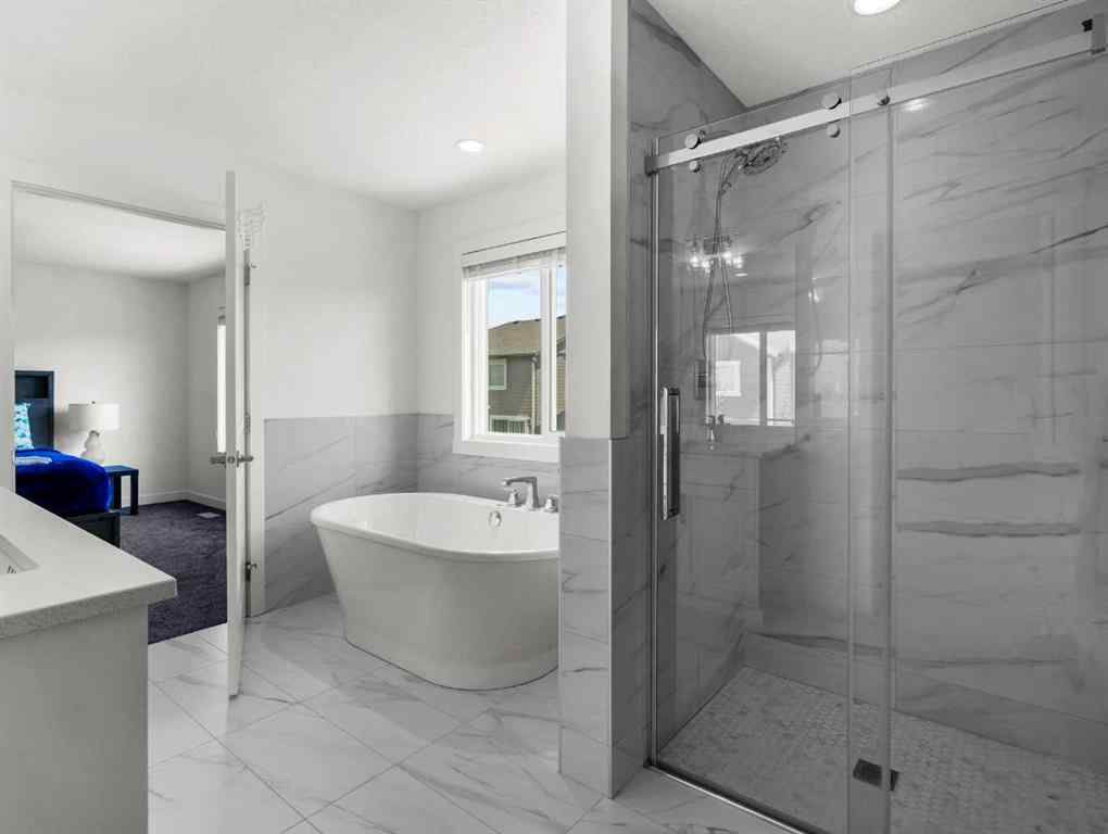 MLS® A2206366 - 18 West Grove Mews SW in West Springs Calgary, Residential