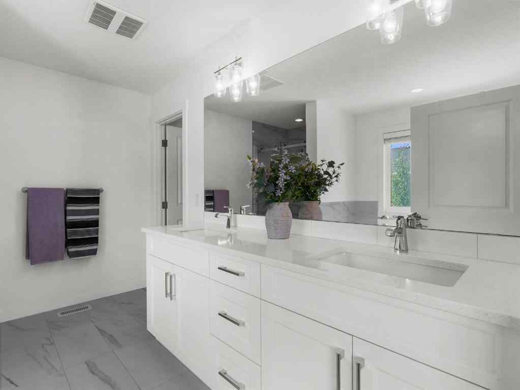 MLS® A2206366 - 18 West Grove Mews SW in West Springs Calgary, Residential