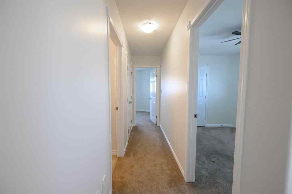 MLS® A2206483 - 11402 82 Avenue  in Westpointe Grande Prairie, Residential