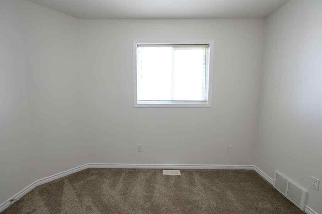 MLS® A2206483 - 11402 82 Avenue  in Westpointe Grande Prairie, Residential