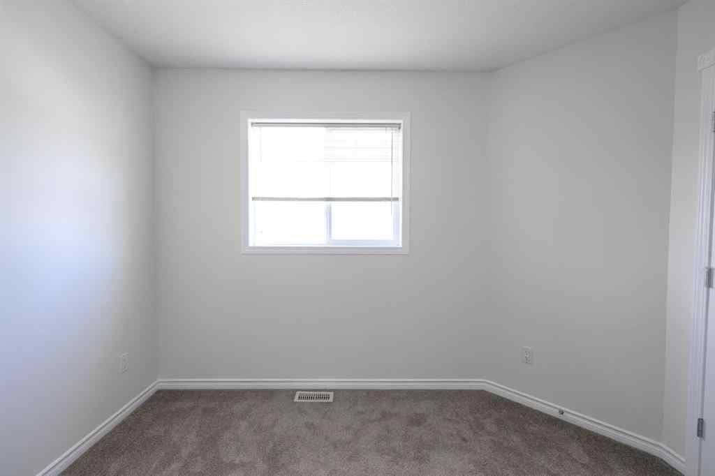 MLS® A2206483 - 11402 82 Avenue  in Westpointe Grande Prairie, Residential