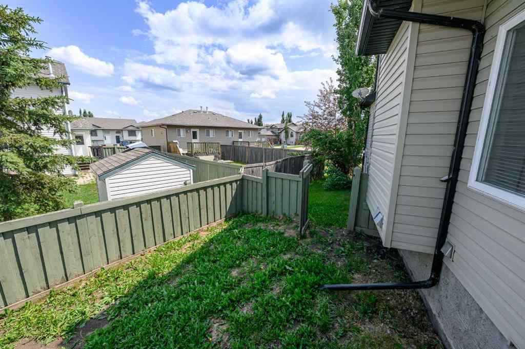 MLS® A2206483 - 11402 82 Avenue  in Westpointe Grande Prairie, Residential