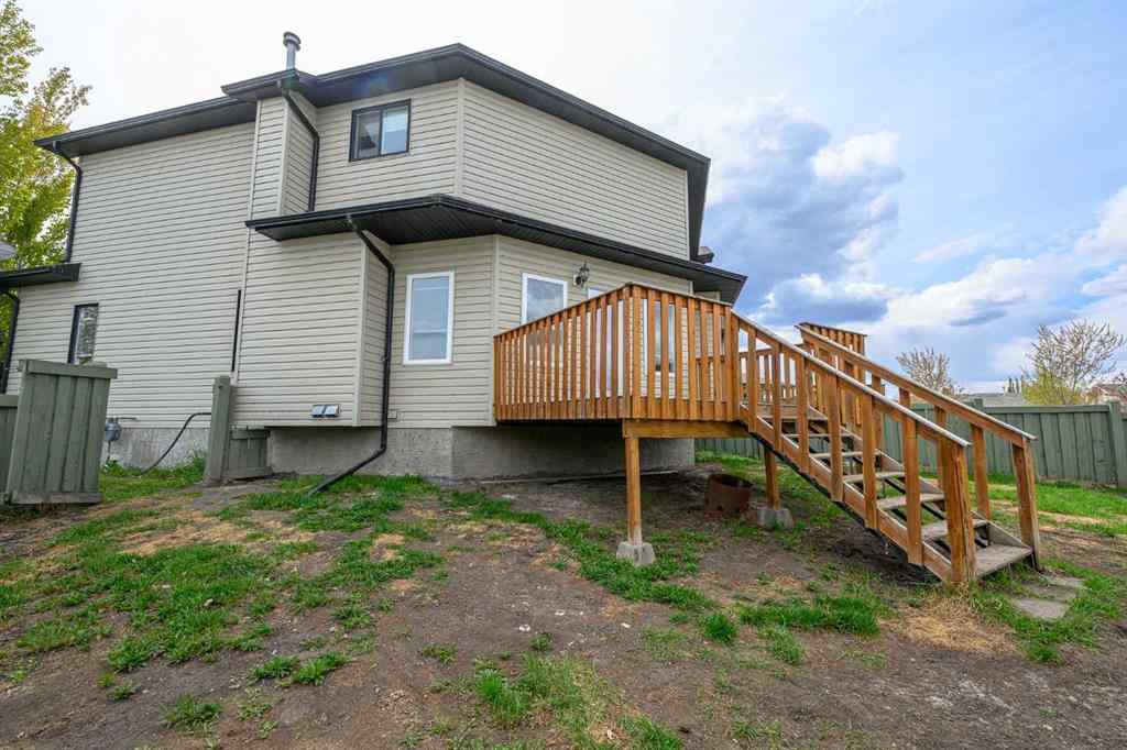 MLS® A2206483 - 11402 82 Avenue  in Westpointe Grande Prairie, Residential