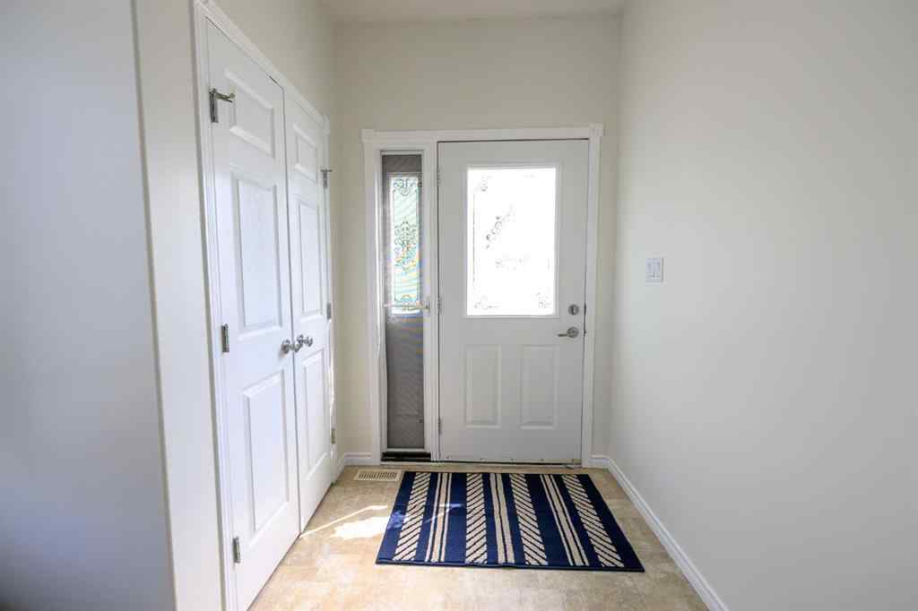 MLS® A2206483 - 11402 82 Avenue  in Westpointe Grande Prairie, Residential