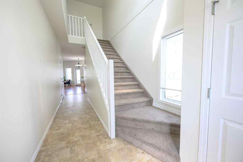 MLS® A2206483 - 11402 82 Avenue  in Westpointe Grande Prairie, Residential