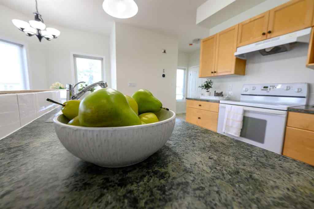 MLS® A2206483 - 11402 82 Avenue  in Westpointe Grande Prairie, Residential