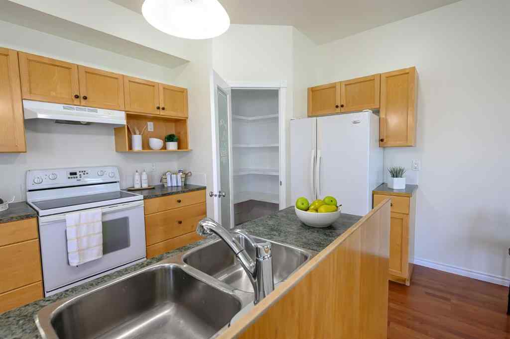 MLS® A2206483 - 11402 82 Avenue  in Westpointe Grande Prairie, Residential