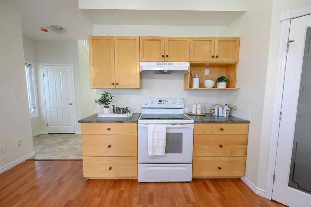 MLS® A2206483 - 11402 82 Avenue  in Westpointe Grande Prairie, Residential