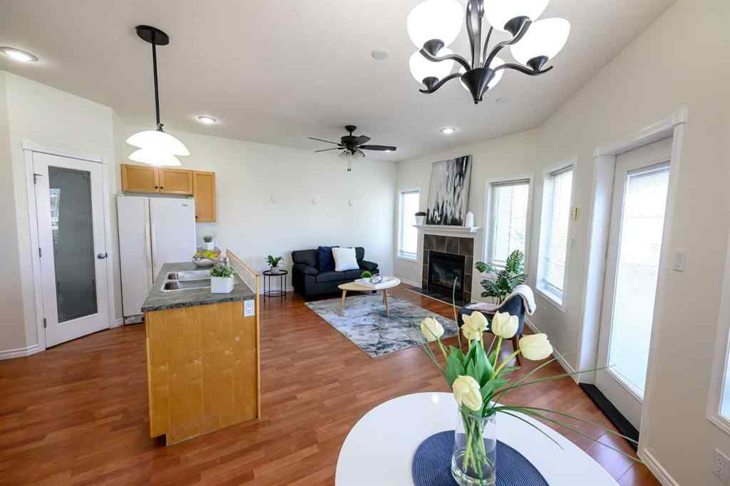 MLS® A2206483 - 11402 82 Avenue  in Westpointe Grande Prairie, Residential