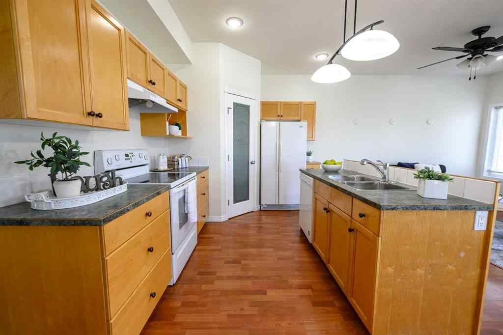 MLS® A2206483 - 11402 82 Avenue  in Westpointe Grande Prairie, Residential