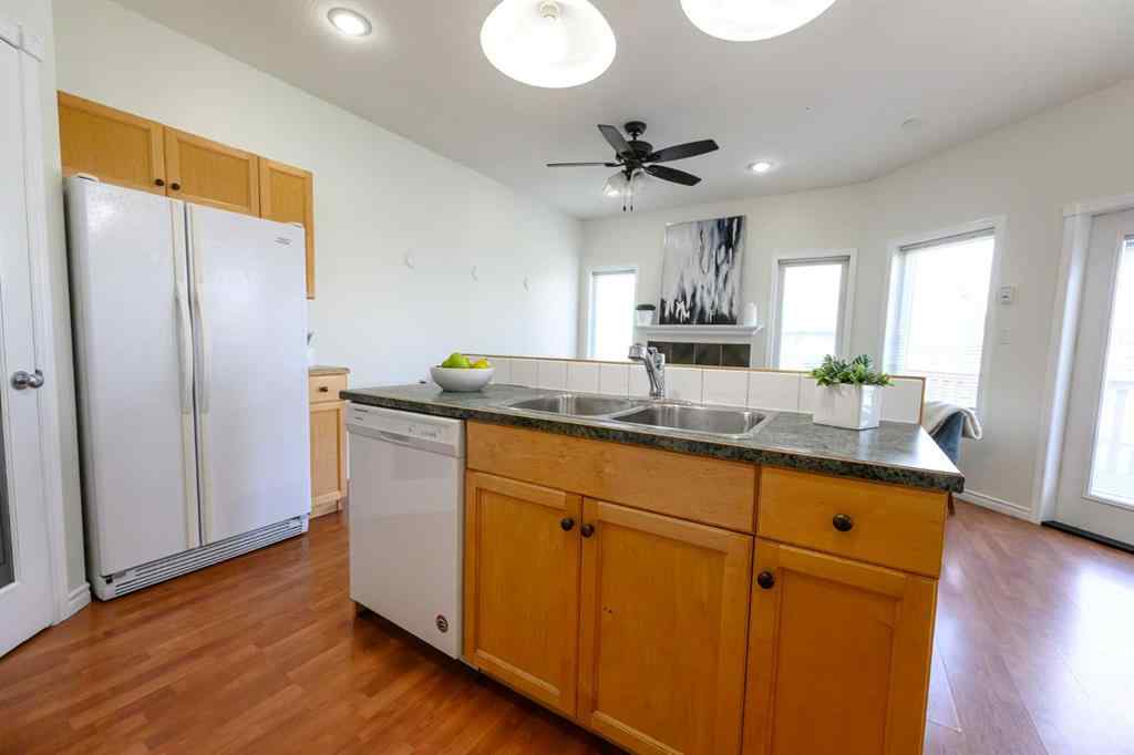 MLS® A2206483 - 11402 82 Avenue  in Westpointe Grande Prairie, Residential