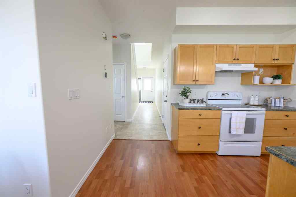 MLS® A2206483 - 11402 82 Avenue  in Westpointe Grande Prairie, Residential