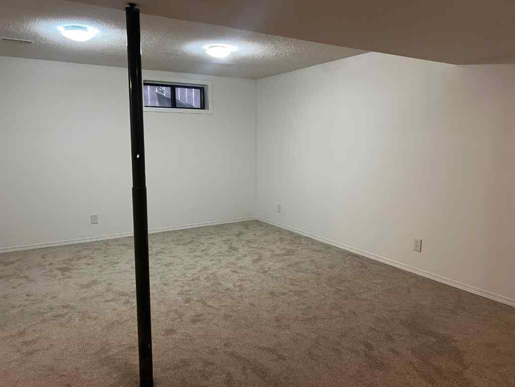 MLS® A2206743 - 1335 4 Avenue SW in Newcastle Drumheller, Residential