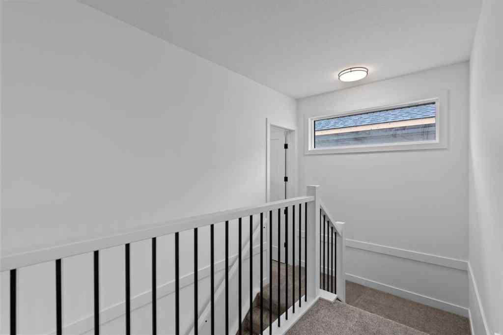 MLS® A2207007 - 1313 South Point Parade SW in South Point Airdrie, Residential