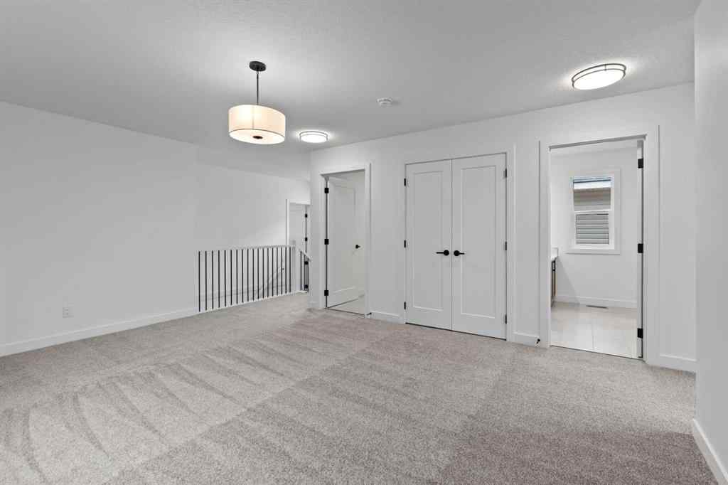 MLS® A2207007 - 1313 South Point Parade SW in South Point Airdrie, Residential