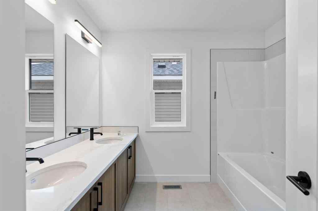 MLS® A2207007 - 1313 South Point Parade SW in South Point Airdrie, Residential