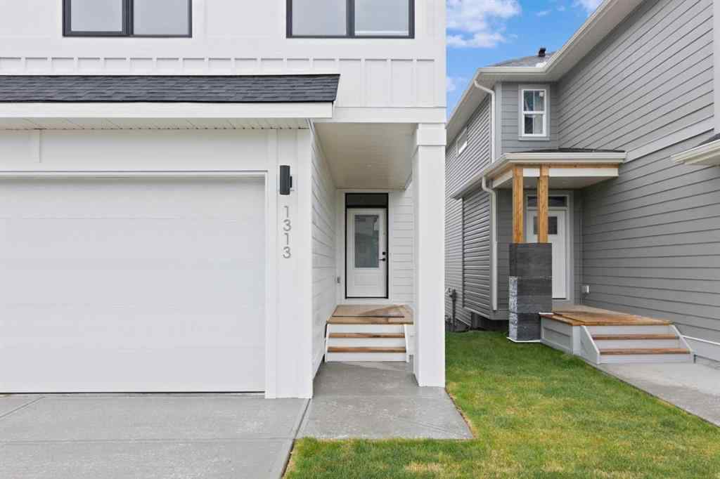 MLS® A2207007 - 1313 South Point Parade SW in South Point Airdrie, Residential