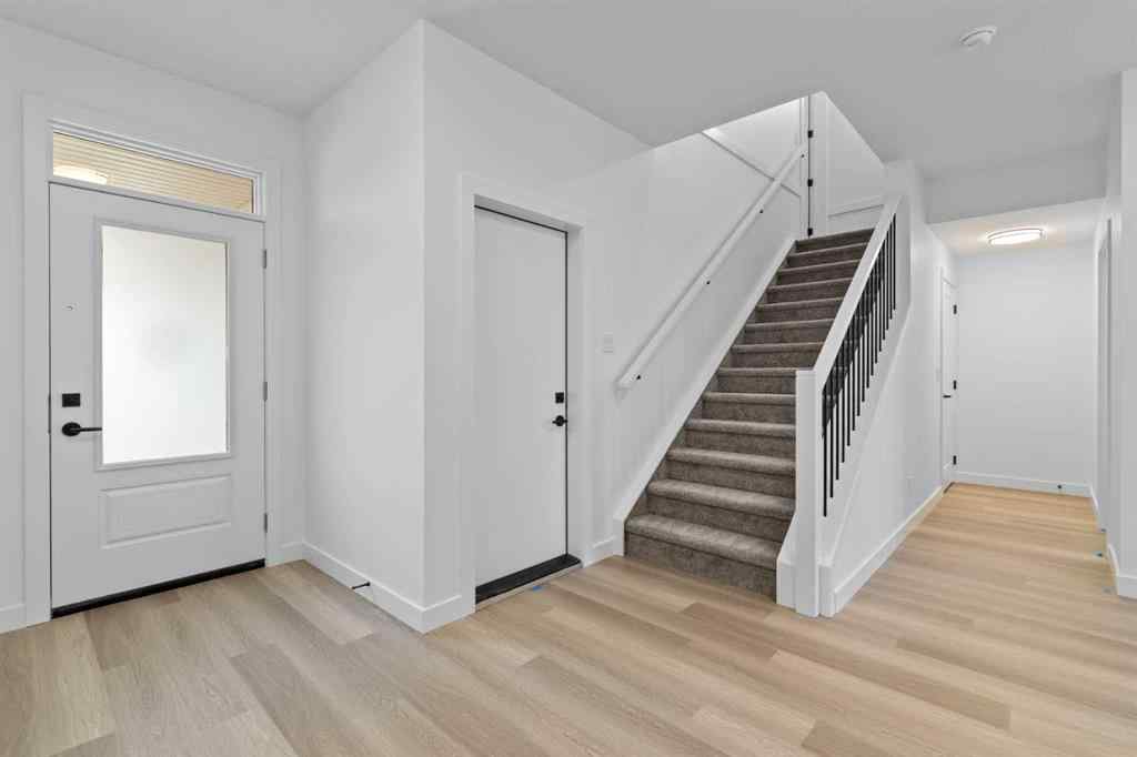 MLS® A2207007 - 1313 South Point Parade SW in South Point Airdrie, Residential
