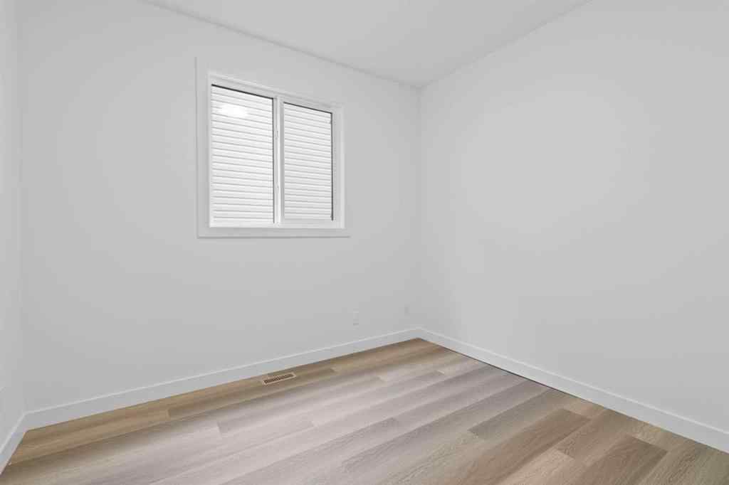MLS® A2207007 - 1313 South Point Parade SW in South Point Airdrie, Residential