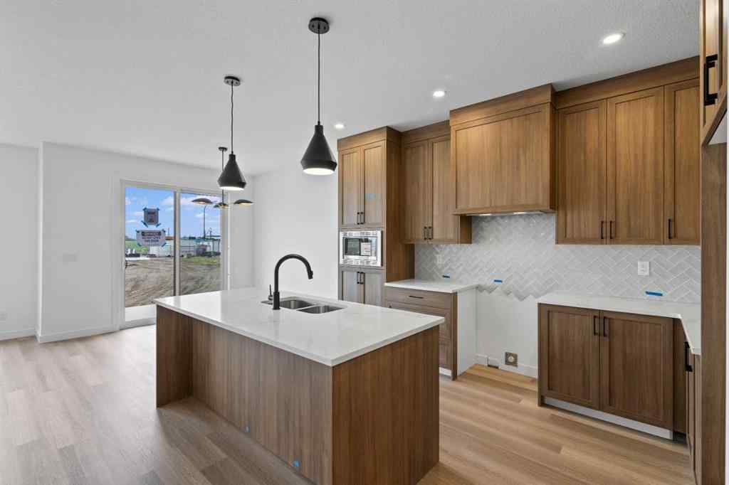 MLS® A2207007 - 1313 South Point Parade SW in South Point Airdrie, Residential