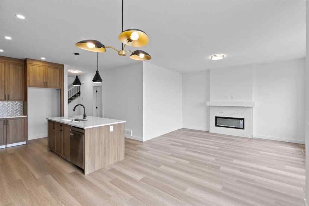 MLS® A2207007 - 1313 South Point Parade SW in South Point Airdrie, Residential