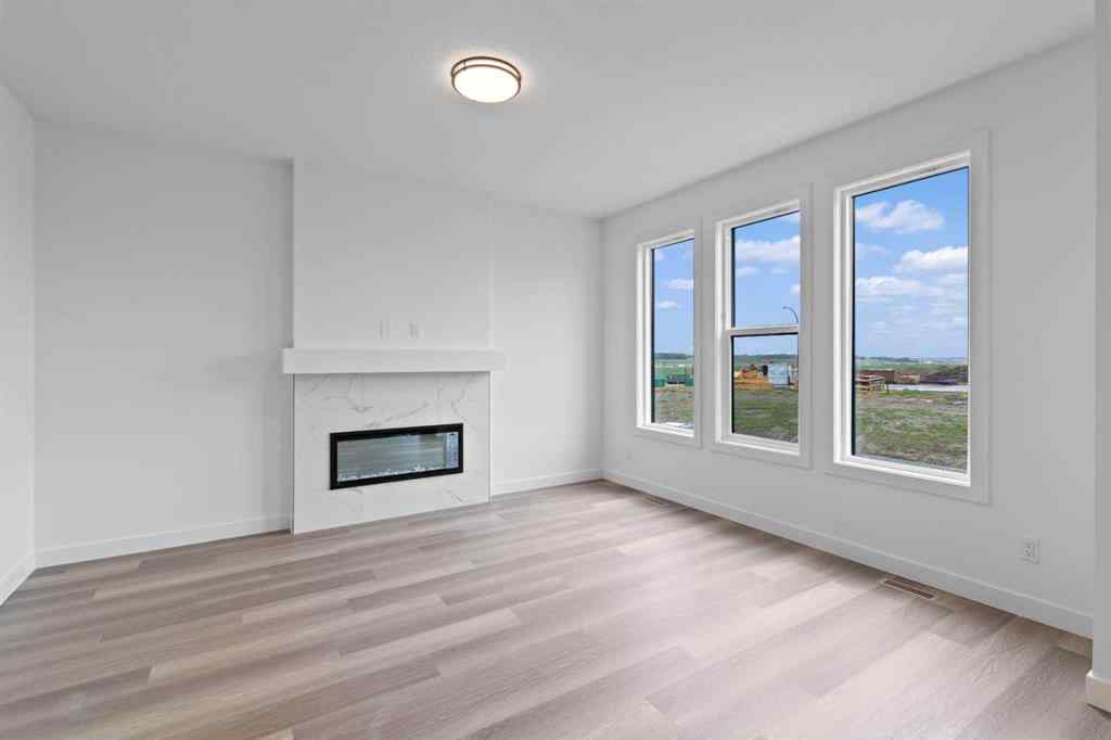MLS® A2207007 - 1313 South Point Parade SW in South Point Airdrie, Residential