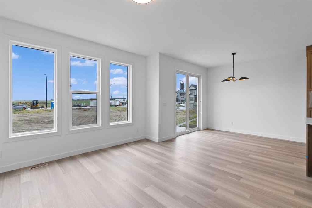 MLS® A2207007 - 1313 South Point Parade SW in South Point Airdrie, Residential